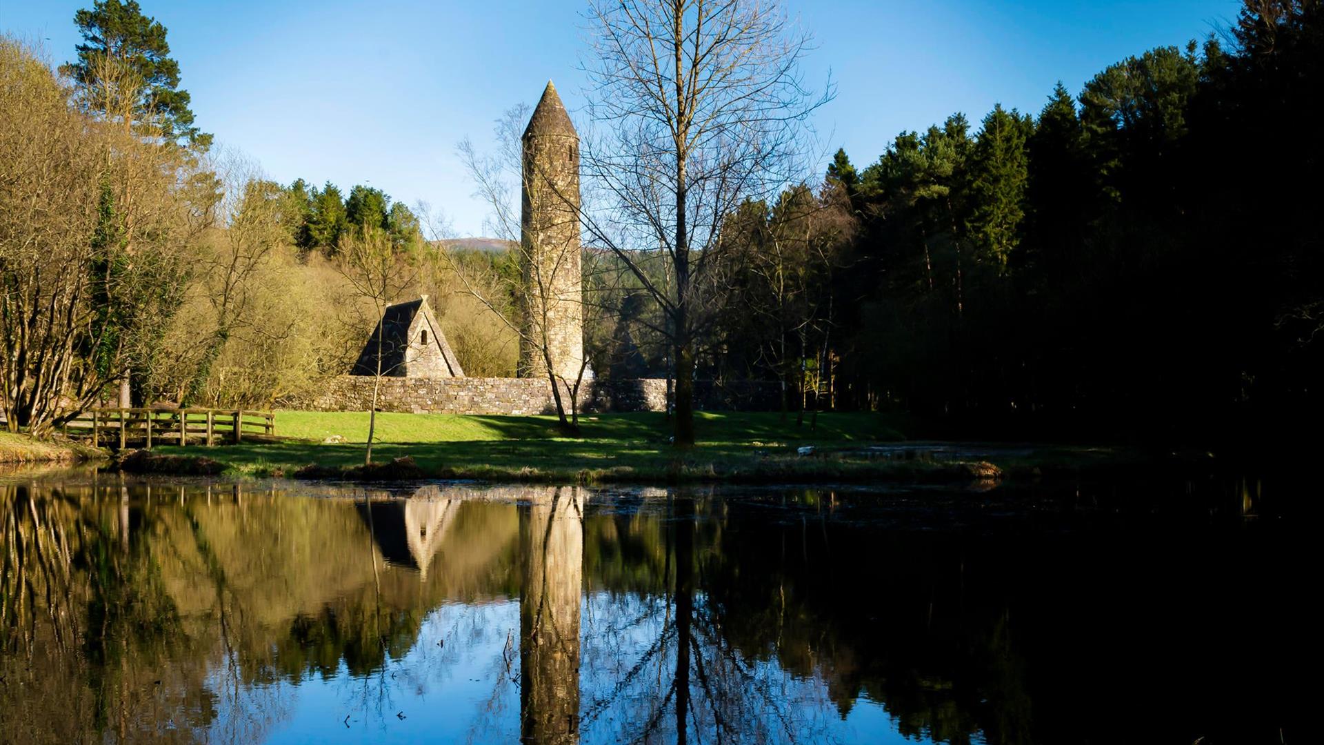 view of lake and historic tower