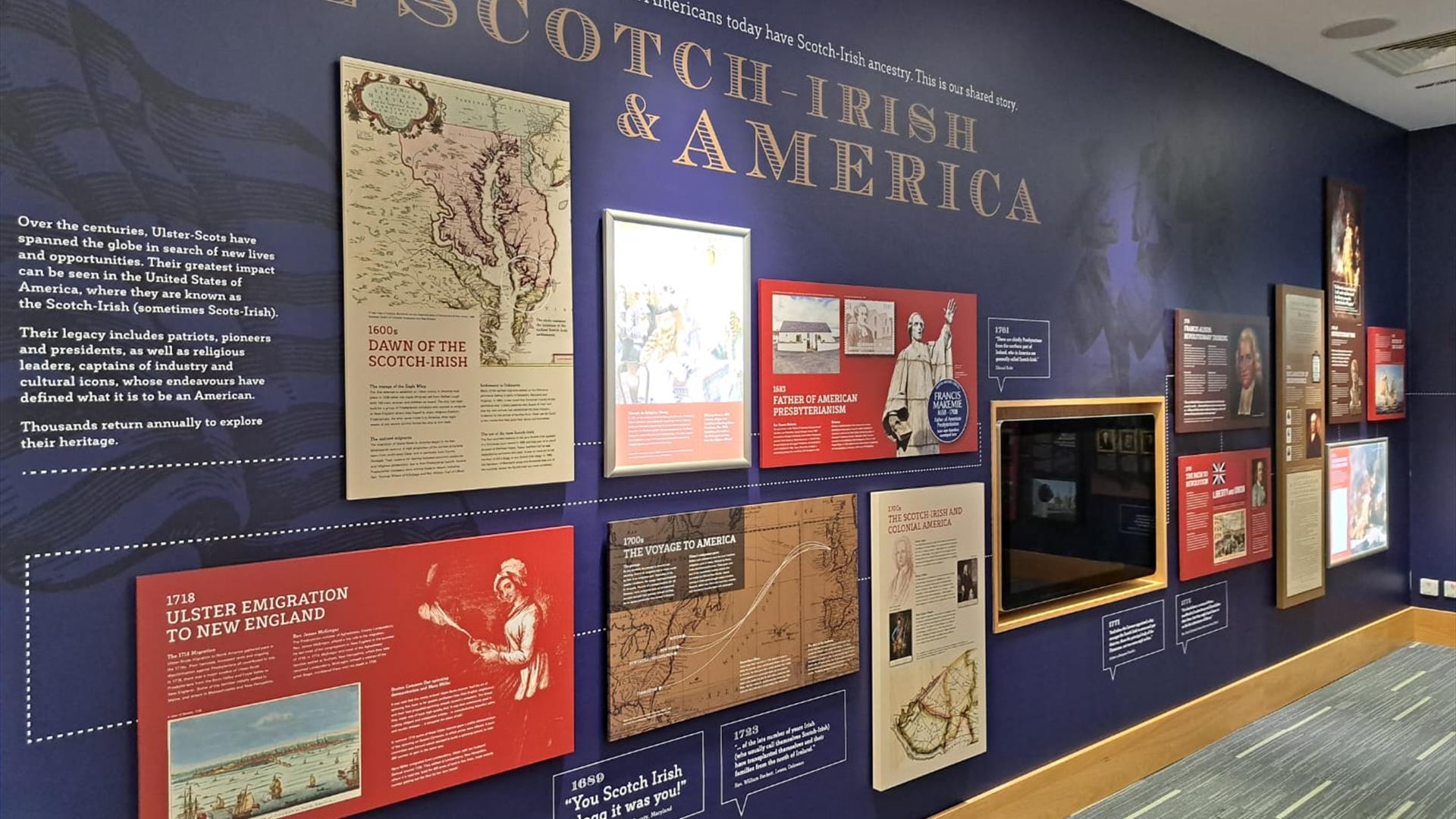 Informative exhibit wall showcasing the history of the Ulster-Scots/Scotch-Irish in America. The information features maps, text panels, and images of