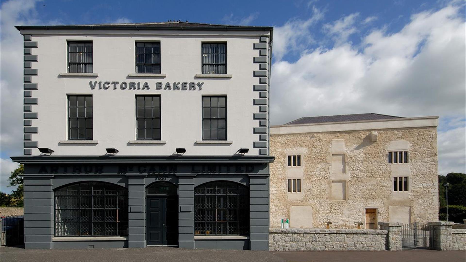 The facade of Bagenal's Castle in Newry, a historic fortified house from the 16th century, now part of a modern museum building.