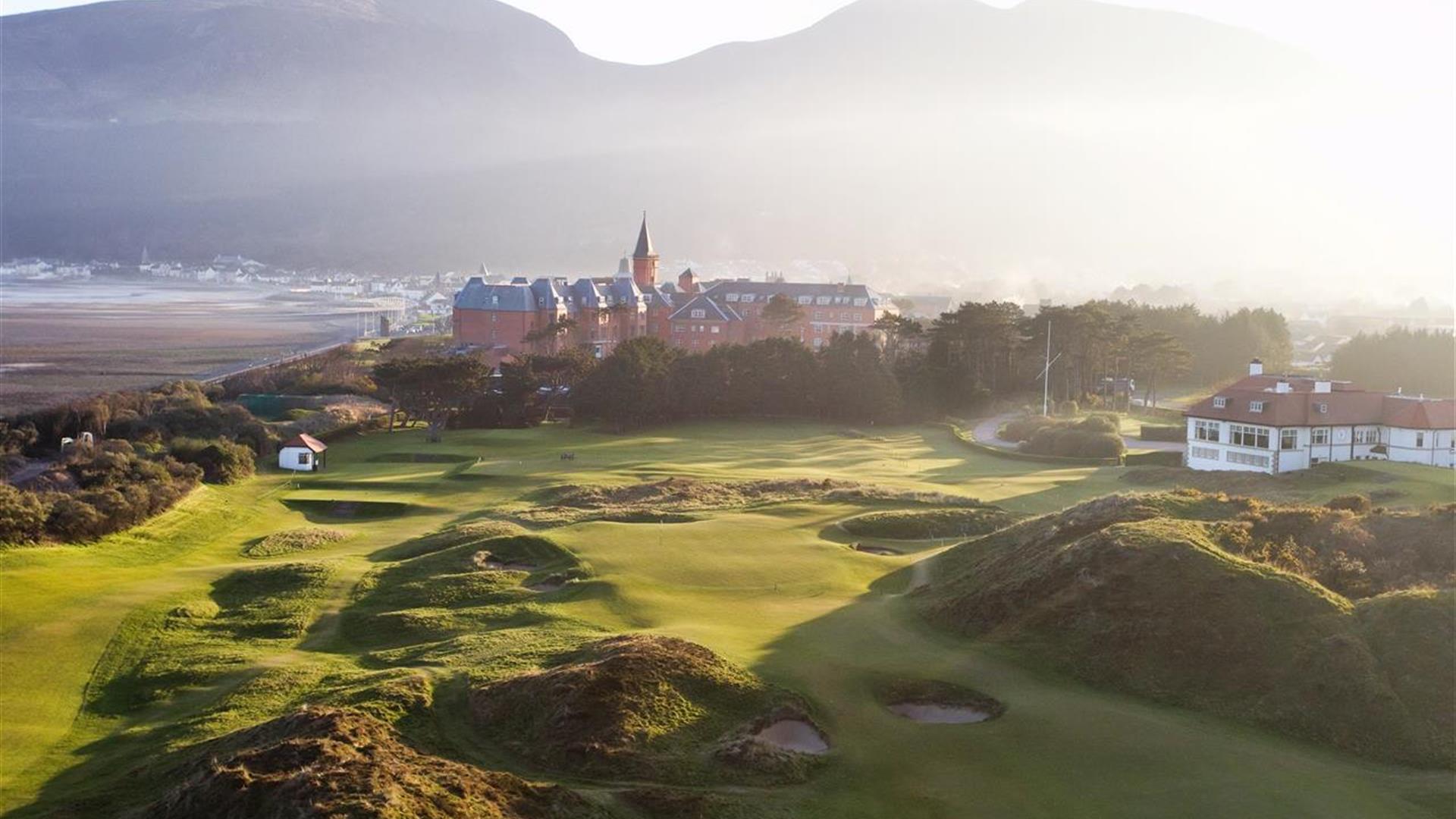 Image showing Royal County Down Golf Course and Slieve Donard Resort and Spa, with Slieve Donard mountain in the background.