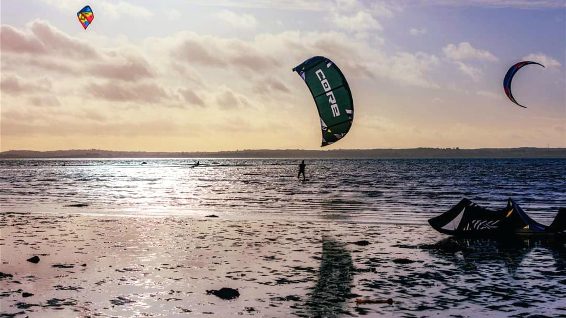 Kite surfers on the water