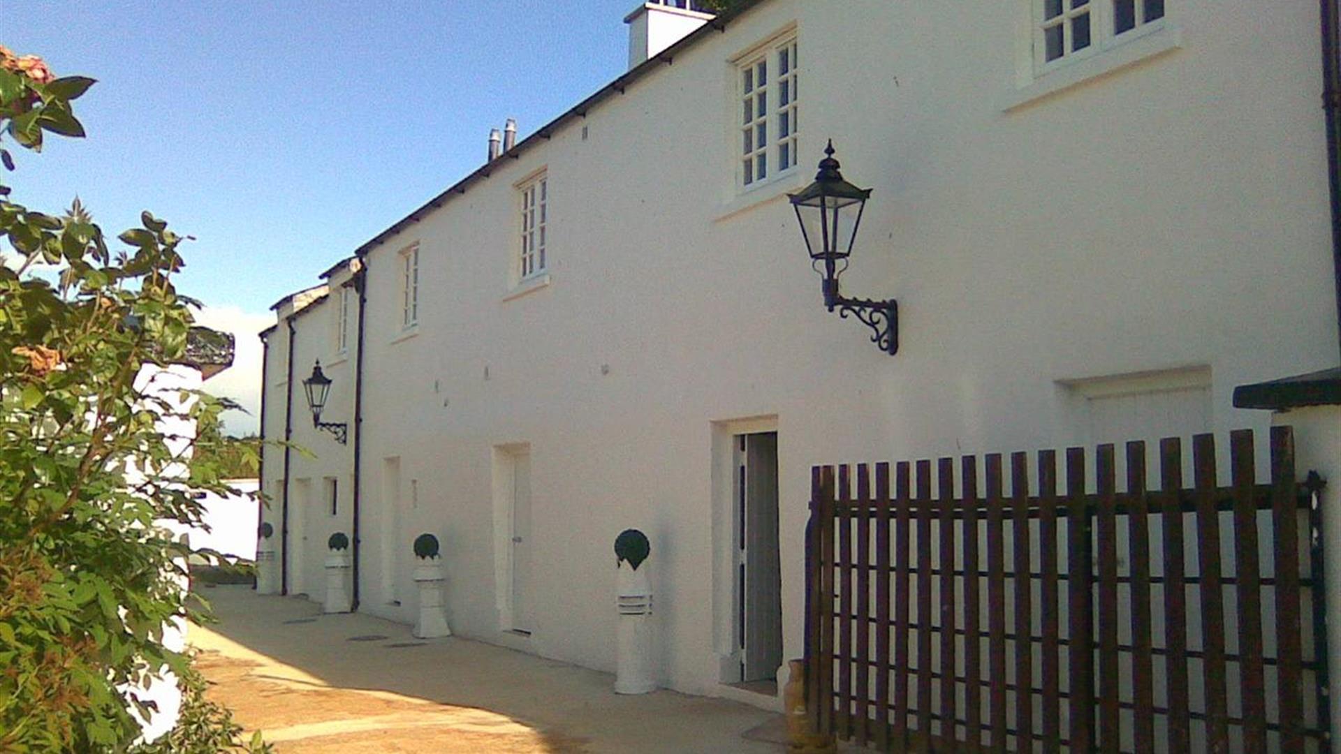 Outside image of white 2 storey building