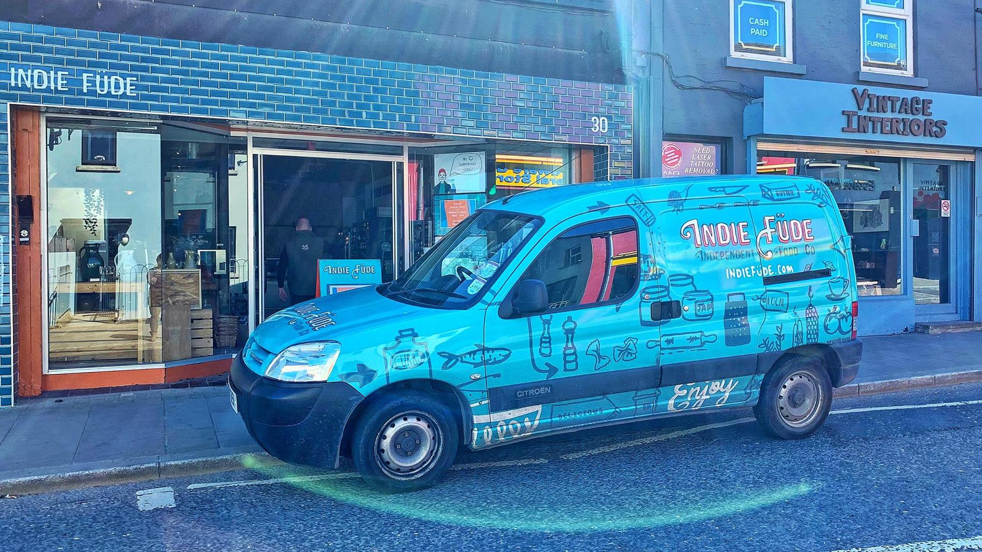 Branded van parked outside of Indie Füde store