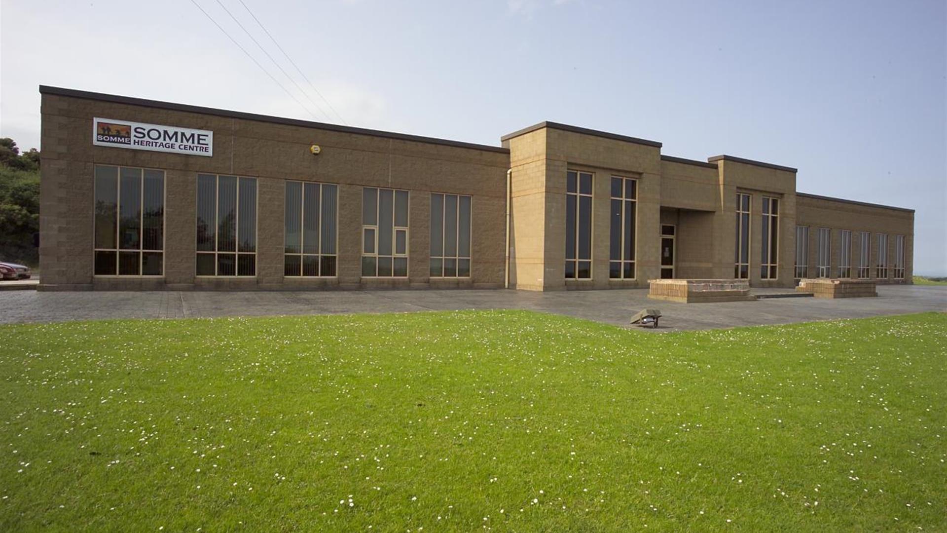 Photo of museum exterior and grassland to front