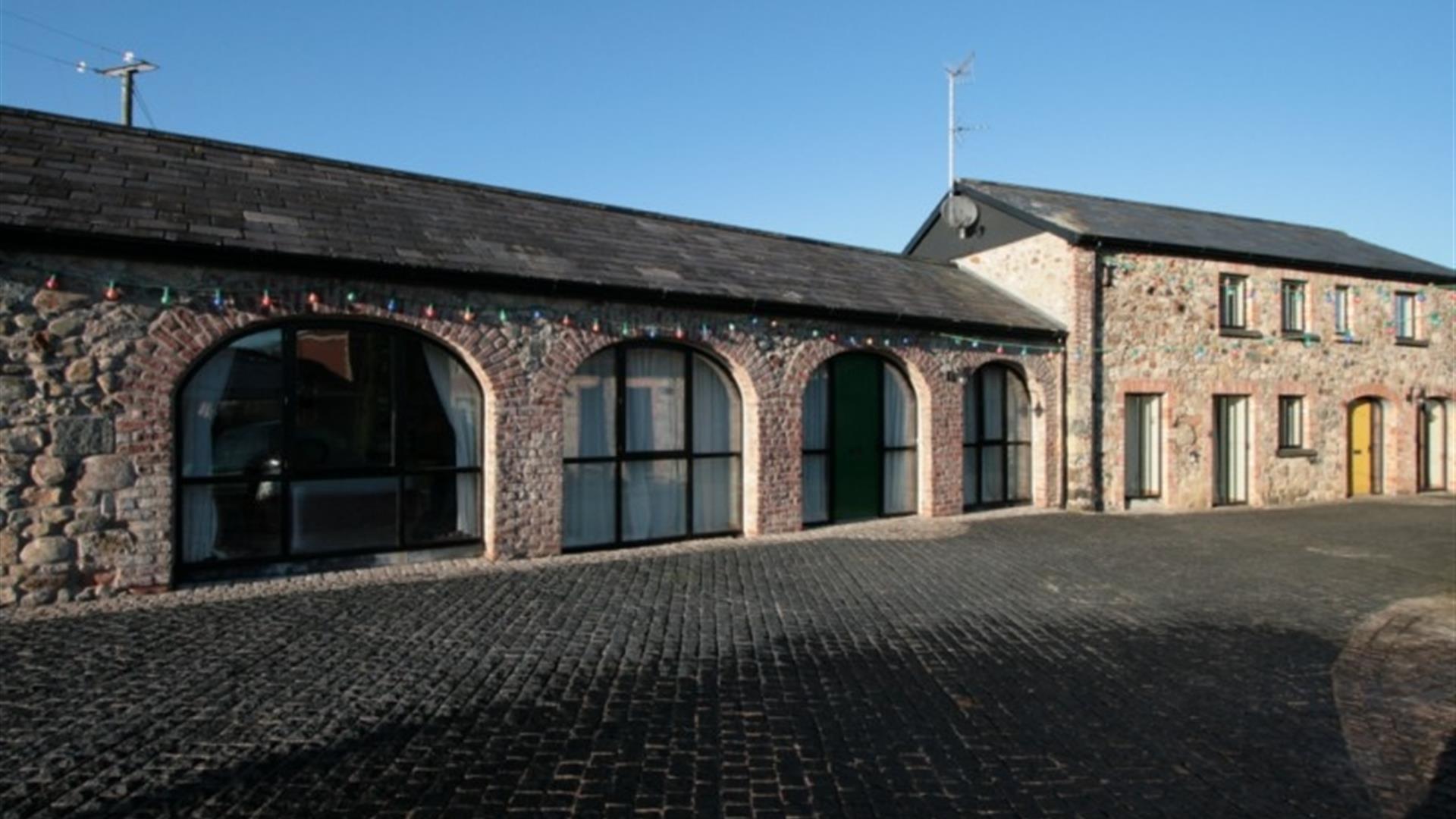 image of the arched windows in a long building