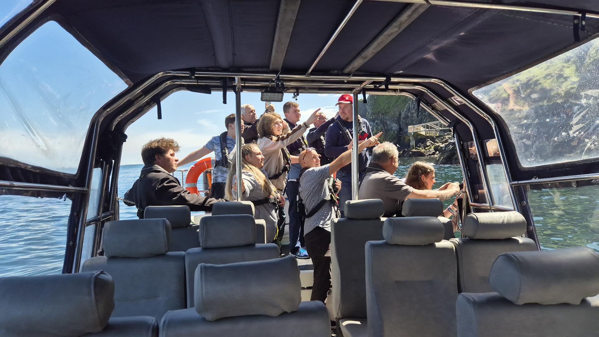 Group of visitors enjoying scenery on Charter Boats NI
