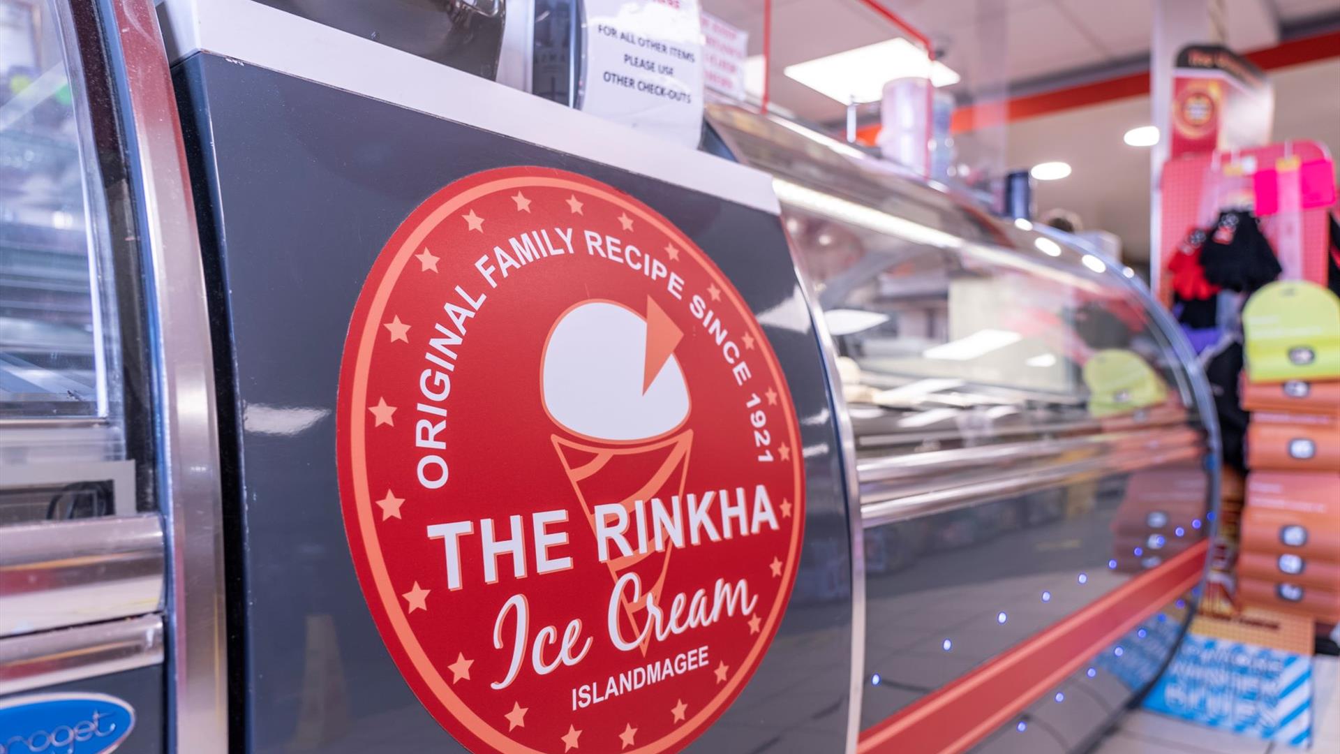 Ice cream serving counter with The Rinkha ice cream logo