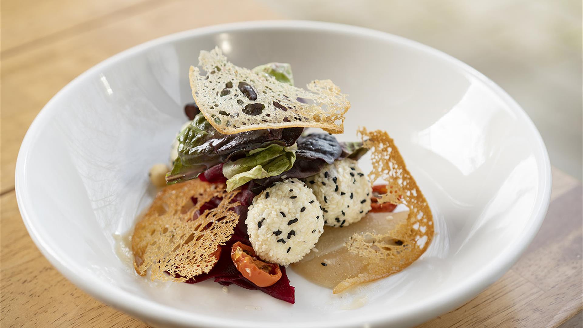 A plate of food on a restaurant table