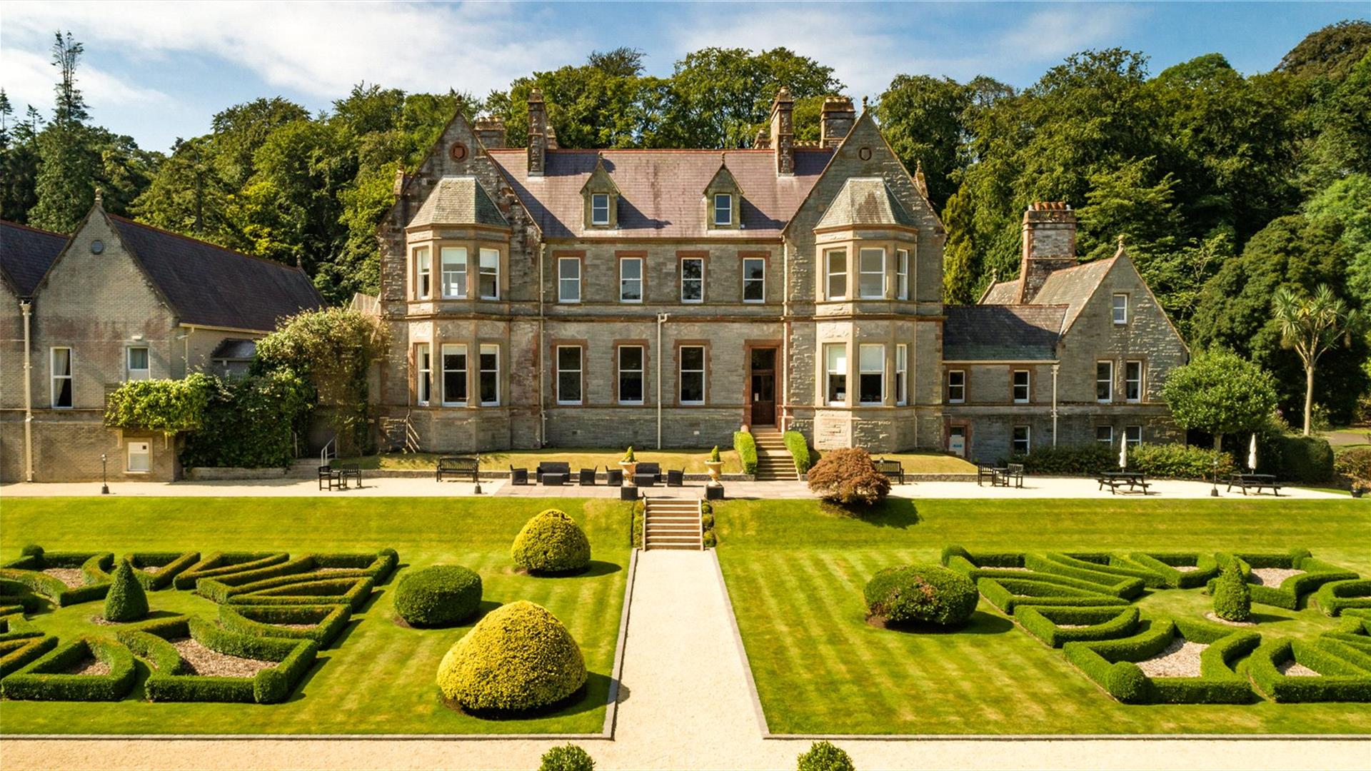 Magherarmorne Estate gardens with house to the rear