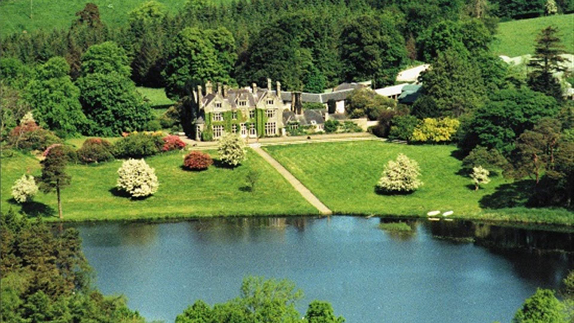 Aerial view of Blessingbourne estate with surrounding greenery and lakes