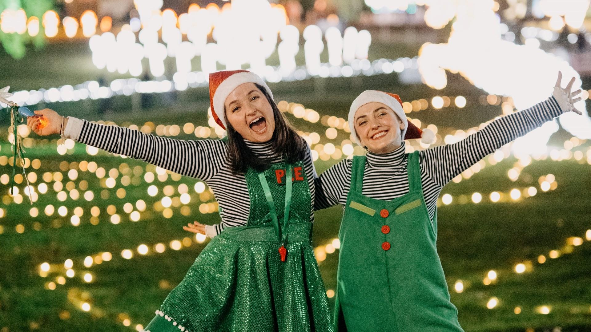 Image is of 2 girls dressed as Elves re the Elfie Tour