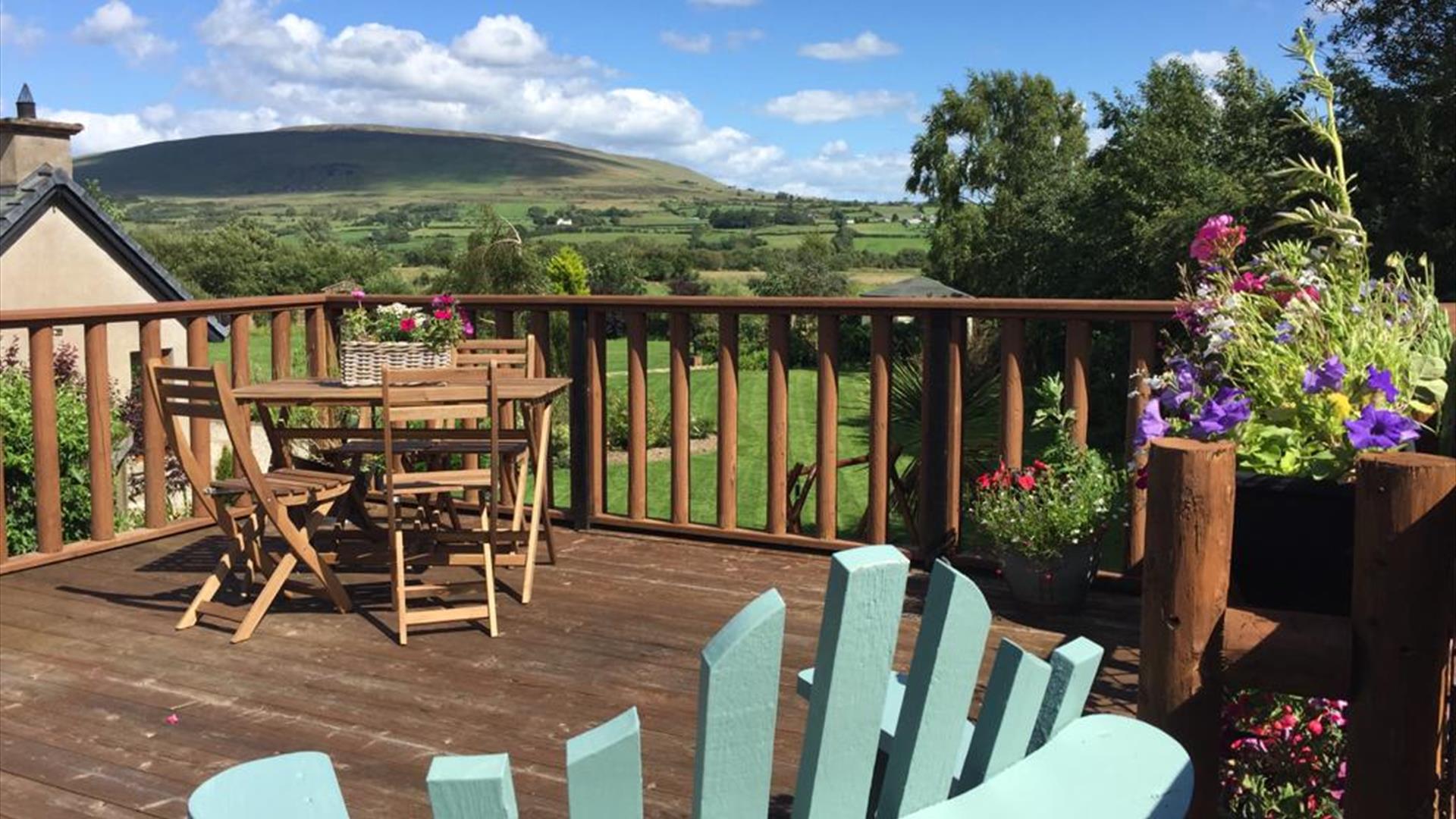 View of Knocklayde and al fresco dining area.