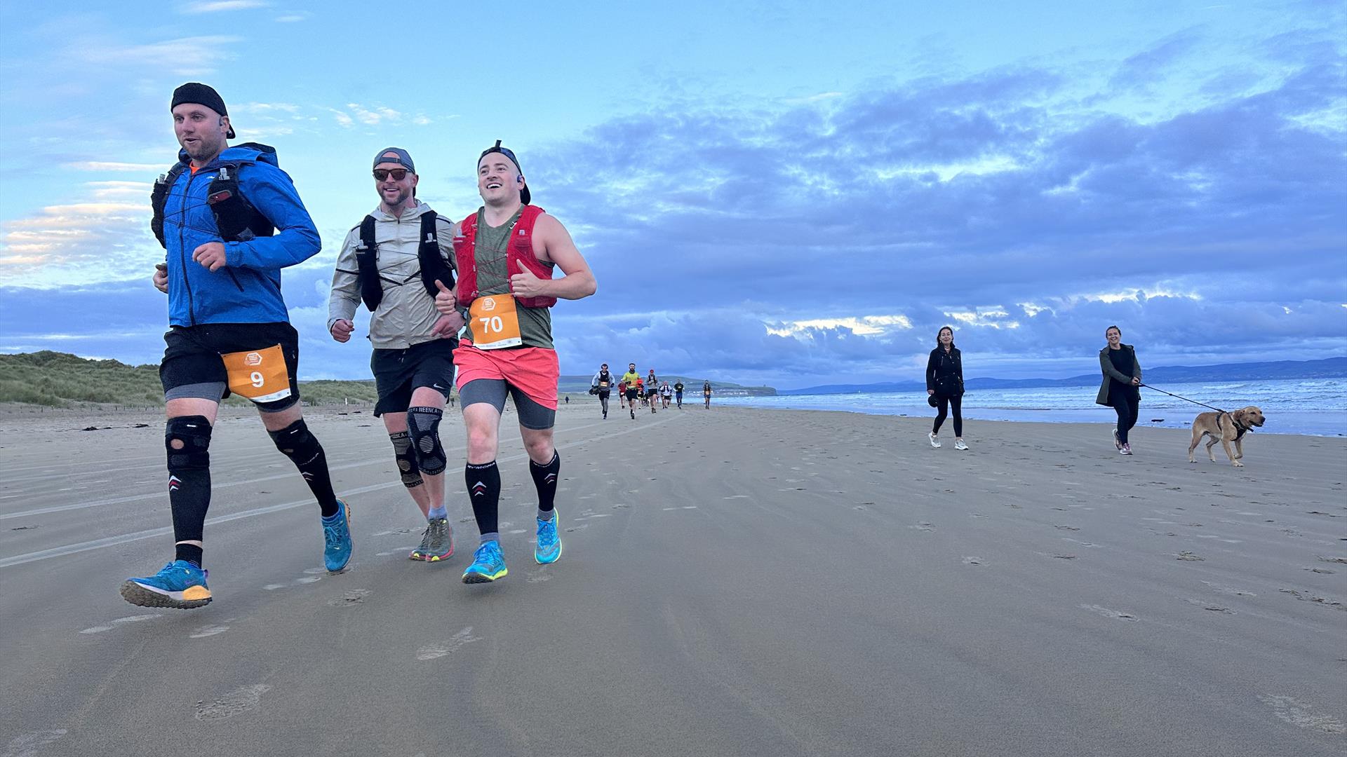 Giants Causeway Coast Marathon runners on beach