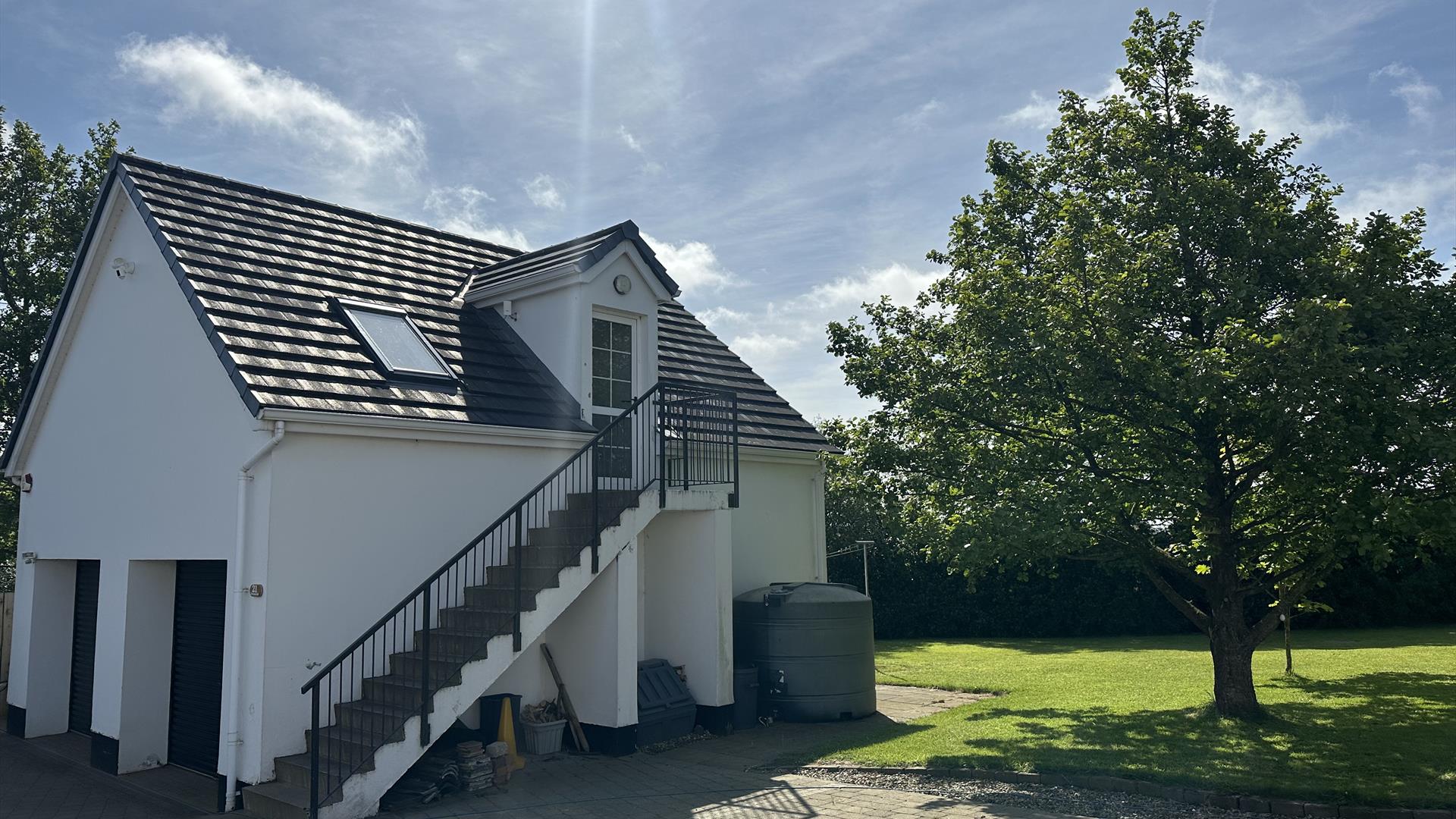 Guesthouse exterior and parking