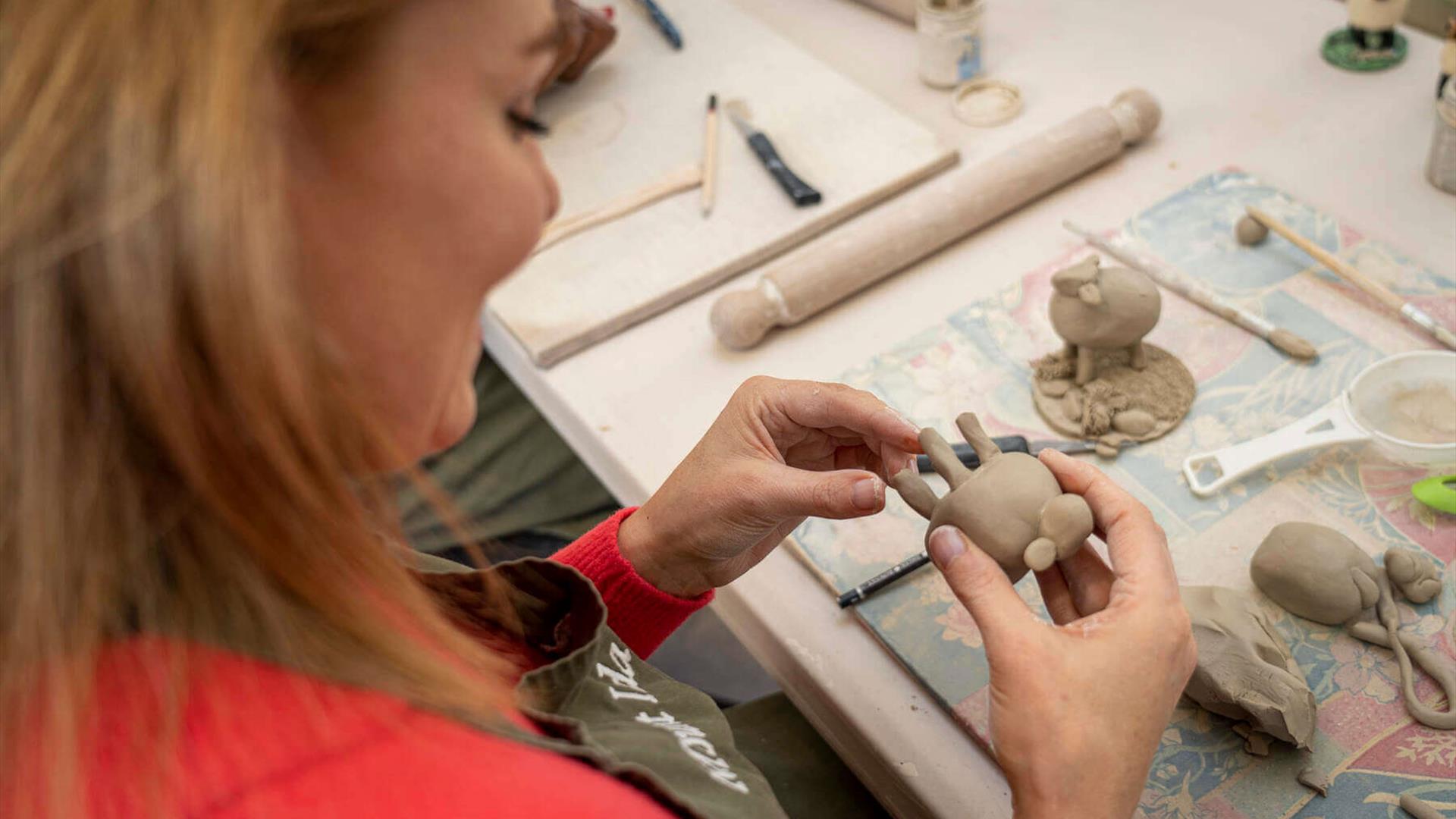 During the handmade to last experience you'll learn how to create your own clay farm animal