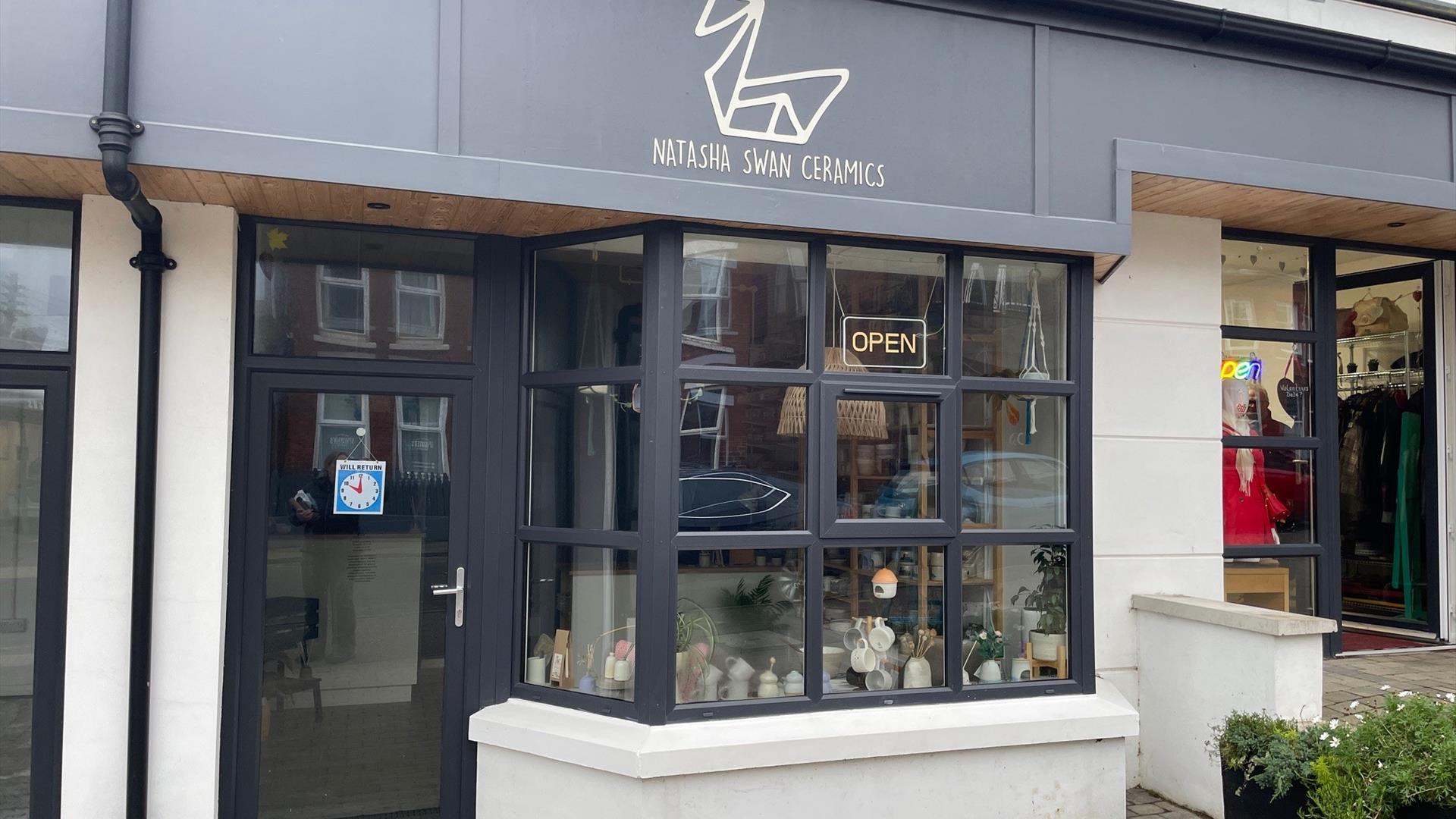Black and white exterior premises of Natasha Swan Ceramics with window display