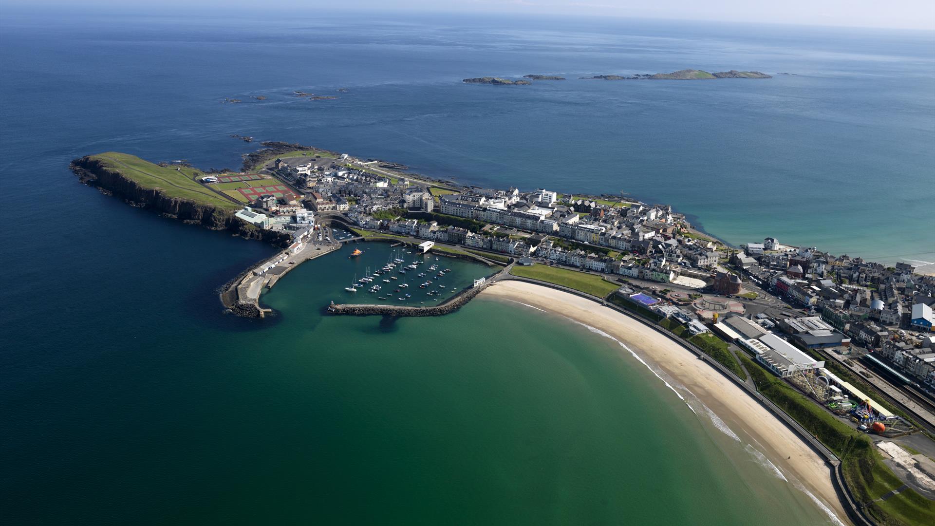 Aerial view of Portrush East strand peninsula