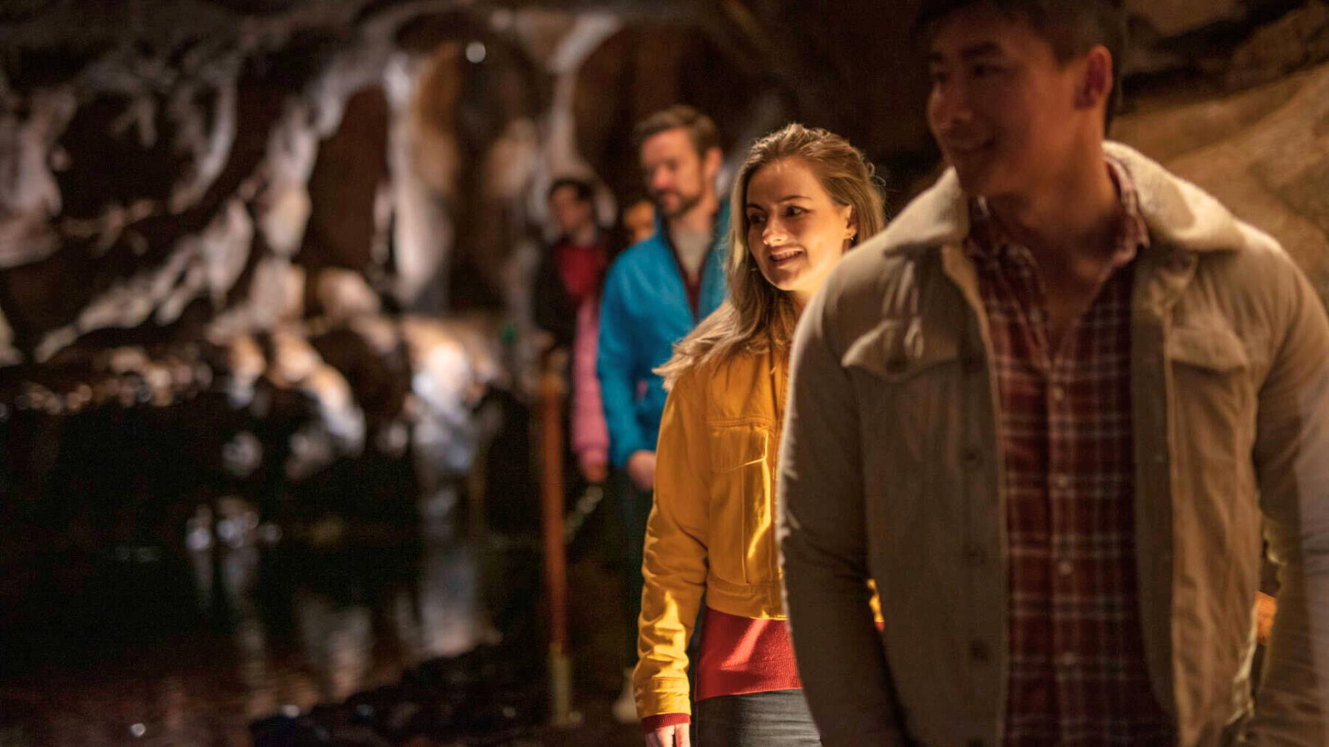 Tour group enjoys walking through the Marble Arch Cave underground experience