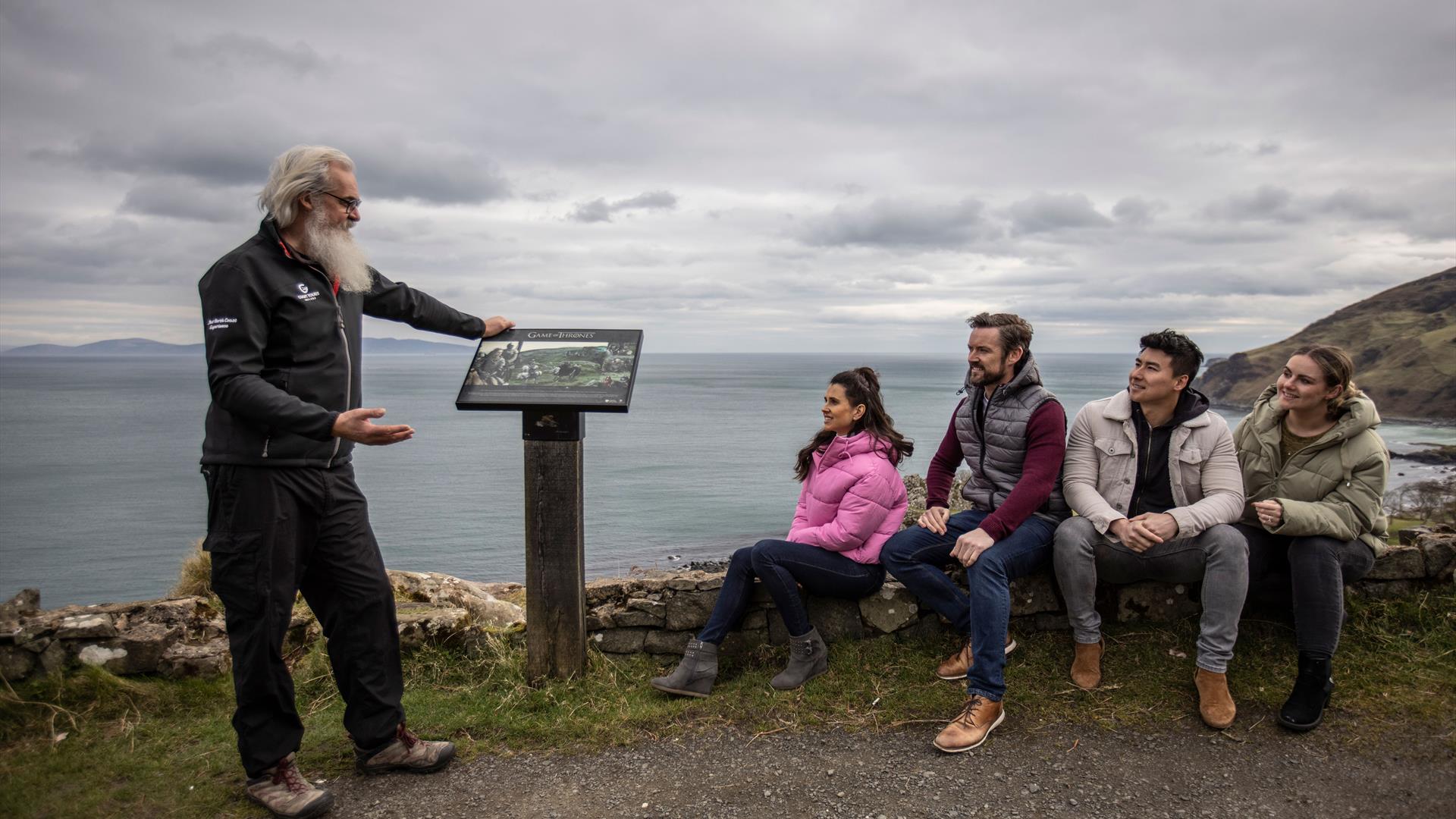 Flip shows a tour group the Game of Thrones info panel