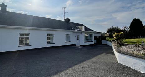 Spacious double bedroom to the back of the cottage with views of the countryside.