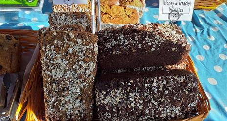 Close up photo of Honey and treacle Wheaten for sale at a stall