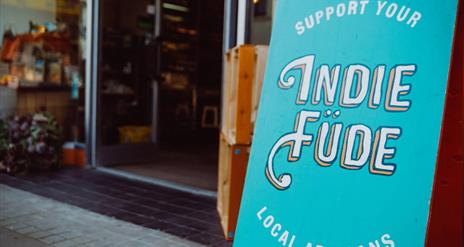 Close up of Indie Füde sign outside of their store