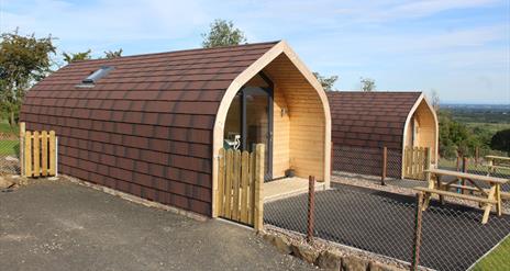 Glamping cabins overlooking scenic mountain view