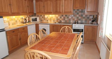 kitchen with dining table at No.6 - Strathroy Mews