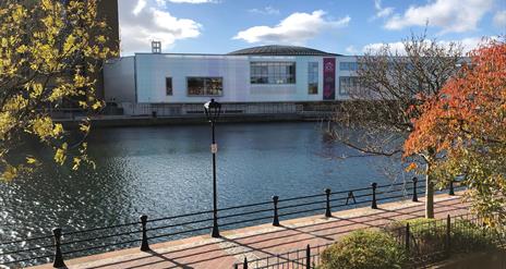 A view of the waterfront hall from across the River Lagan taken from an apartment window.
