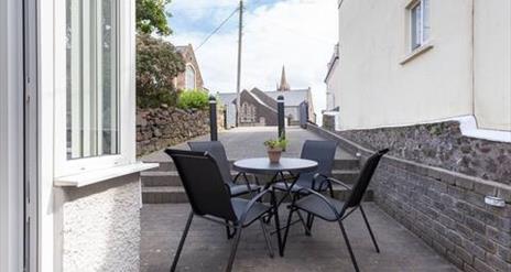 Outdoor patio area with furniture