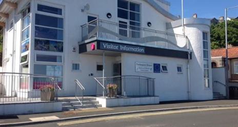 Outside view of the Ballycastle Visitor Centre Building - Portngaree House with Visitor Information sign