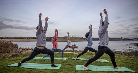 Sunrise SUP & Island Yoga Experience