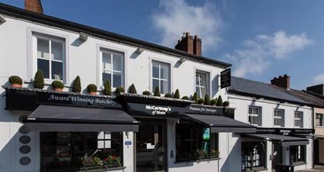 Image is of shop front facing out onto street