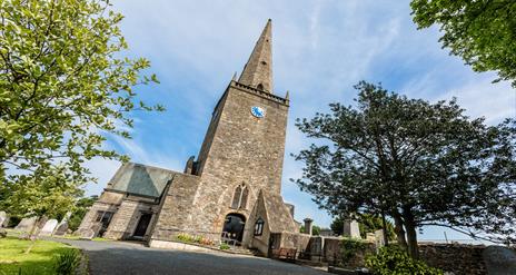 Image of the front of Bangor Abbey on a bright sunny day