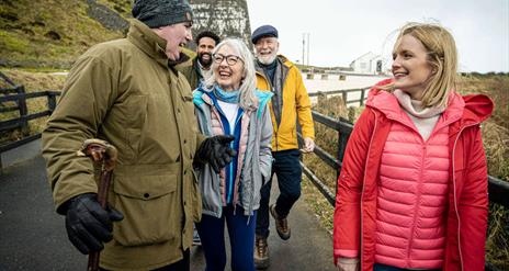 Mark Rodgers leads group towards the carrick-a-rede rope bridge