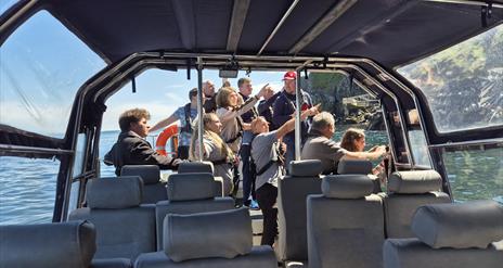 Group of visitors enjoying scenery on Charter Boats NI