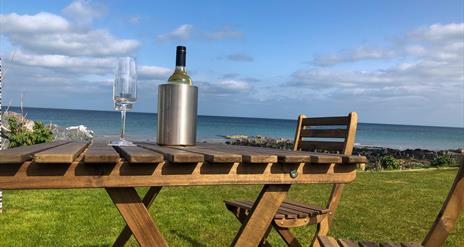 Outdoor seating with view to the sea