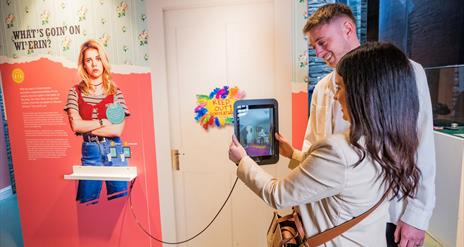 Guests interact with exhibitions at the Derry Girls Exhibition