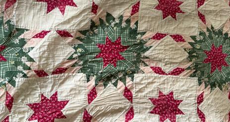 Close up of the star pattern on an Ulster American Folk Park Quilt