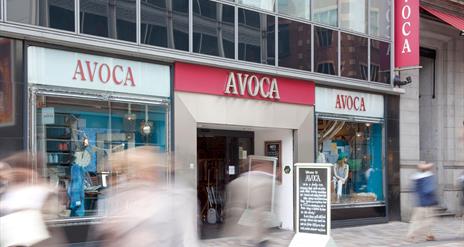 Exterior of a city centre shop selling household goods and food.