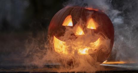 Halloween Pumpkin pumpkin lit up in a smoky atmosphere
