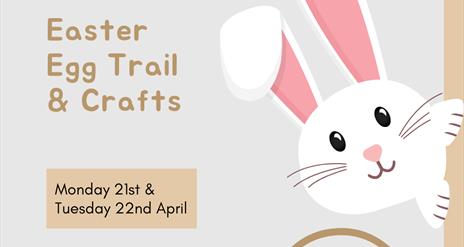 Cartoon image of a bunny and a basket full of Easter eggs with event details written