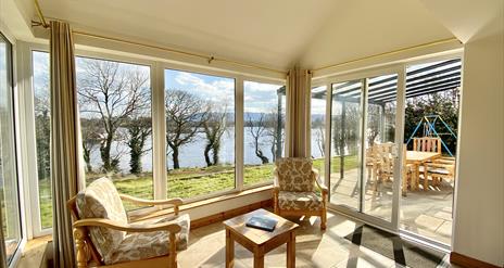 View of a sunroom at Shamrock Cottage, which overlooks Lough Erne, Co. Fermanagh, Northern Ireland.