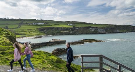 Family walking around Portmuck Harbour