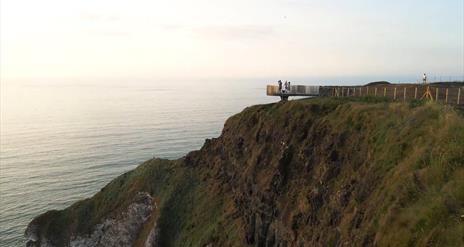 people standing on the viewing platform at Magheracross viewpoint