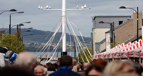 Image of Holywood Maypole dressed with ribbons for the annual May Day dancing event