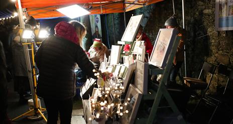 Lady browsing stalls at Carryduff Christmas Market