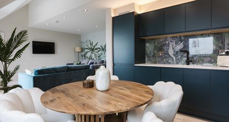 interior of open plan kitchen, dining and living space at DB Stays 'The Nest'