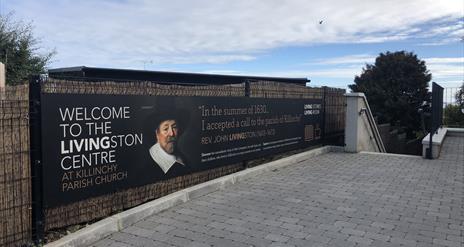 Exterior to the centre with welcome banner