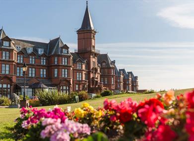 Slieve Donard hotel and ground with sun shining